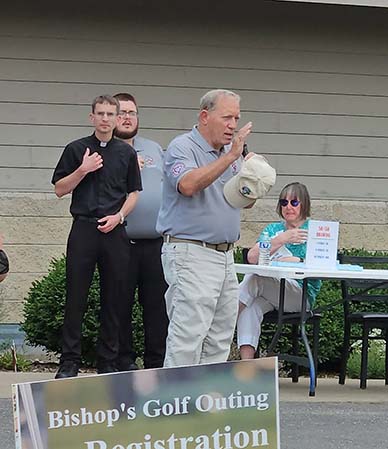 Bishop Gruss giving the blessing before Golf outing