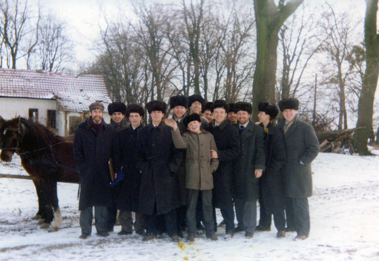 This photo (circa 1993) was taken in a village in Ukraine where Dr. Dan Osborn (pictured far right) worked to create a home for underprivileged children.