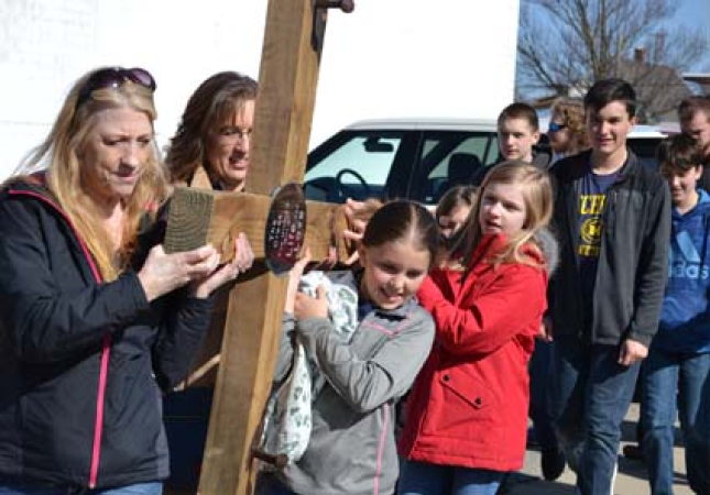 Family on Cross Walk Good Friday St. Brigid Midland