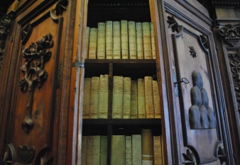 Old volumes are pictured in a wooden cabinet in the Vatican Apostolic Archives 