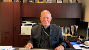 Bishop Gruss at his desk