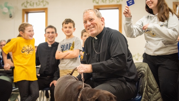 Bishop and Coco at St. Elizabeth School Reese