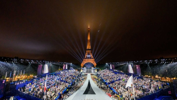 The Trocadero venue is seen, with the Eiffel Tower looming in the background, as the Olympic flag is raised July 26