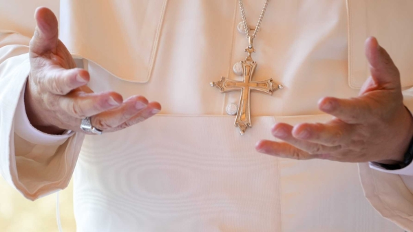 Pope Leo XIV gestures as he offers brief remarks during a luncheon with guests assisted by the Albano diocesan Caritas agency