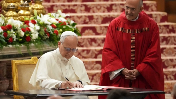 Pope Leo XIV signs the apostolic letter “Drawing New Maps of Hope," marking the 60th anniversary of the Vatican II declaration on Catholic education