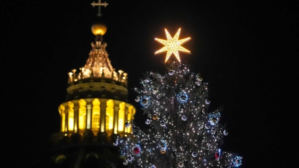 The Christmas tree is lit in St. Peter’s Square at the Vatican Dec. 15, 2025