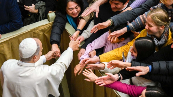 Pope Leo XIV greets people at the conclusion of his weekly general audience