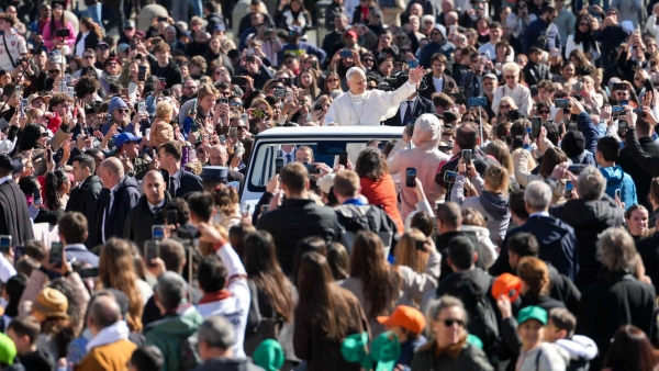 Pope Leo XIV greets visitors and pilgrims from the popemobile
