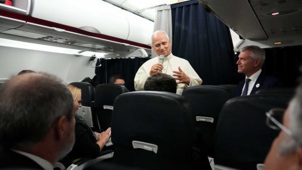 Pope Leo XIV speaks with journalists