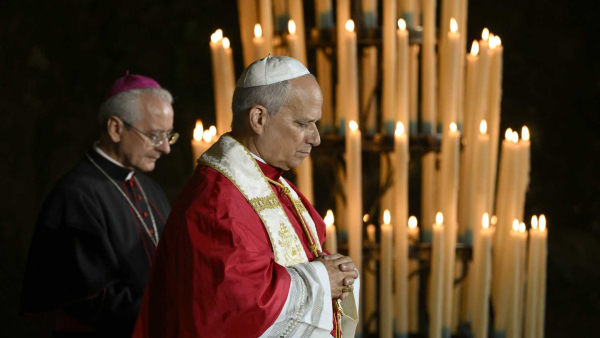 Pope Leo XIV prays at the Grotto of the Apparitions